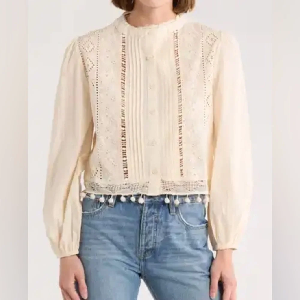 Elegant Cream Blouse with Embroidered Detailing